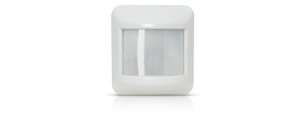 Wired Corner Mount PIR Sensor mounted on wall